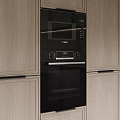 Modern Kitchen Interior Design With Sleek Cabinets Island Counter And Appliances