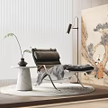 Modern Leather Lounge Chair With Marble Side Table Plant Plush Rug And Wall Art