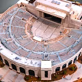 European Style Architecture Circular Open Air Theater With White Exterior Arched Windows And Seating