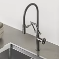 Modern Black Swivel Kitchen Faucet On Gray Countertop With Stainless Steel Sink And Bowls