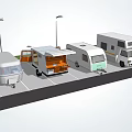 Different Types Of RVs Parked In Parking Lot With Street Lamps And Grass