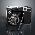 Vintage Analog Folding Camera With Classic Design And Metal Parts In Retro Style