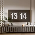 Modern TV Stand Design With Geometric Striped Wall And Decorative Items Potted Plants Clock Candles