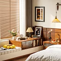 Bay Window Cabinet in Bedroom with Bed Table Lamp Books and Fruits