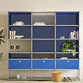 Modern Blue Bookcase With Multiple Shelves Books Decor Drawers And Potted Plant