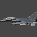 Gray Military Fighter Jet Flying With Underwing Missiles And Clear Cockpit
