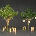 Two Decorative Trees with Green Foliage Golden Cylindrical Lights Hanging White Ornaments Wooden Stumps Around