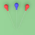 Three Red and Blue Droppers with Clear Tubes on Green Background