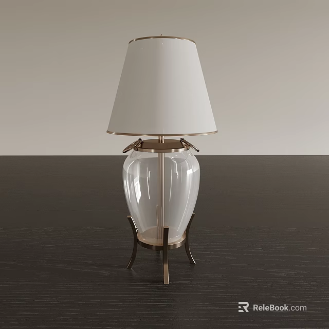Modern Table Lamp With White Lampshade Transparent Glass Body And Metallic Base On Dark Tabletop 3d model 