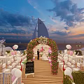 Waterfront Wedding Setup With Flower Arch Wooden Walkway And Yachts At Sunset