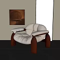 Elegant Modern Leisure Chair With Beige Padded Seat And Dark Wooden Legs In Minimalist Interior