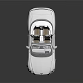 White Luxury Convertible Car With Sleek Design And Open Top Front Grille And Alloy Wheels