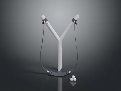 Y Shaped Slingshot With White Body Black Elastic Bands Base And Marbles 3d model