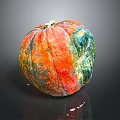Vibrant Multi Colored Textured Pumpkin On Black Background With Reflective Surface