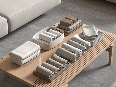 Soft Various Colored Towels on Wooden Coffee Table Neatly Folded and Rolled for Home Use 3d model