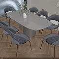 Oval Beige Dining Table Set With Gray Metal Leg Chairs And Wooden Floor