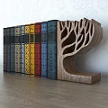 Wooden Tree Shaped Bookend Holding Colorful Decorative Books In Home Interior