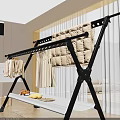 Sturdy Black Metal Clothes Rack With Hanging Clothes Quilt And Lower Storage Shelf