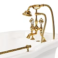 White Vintage Bathtub With Gold Fixtures Ornate Legs And Classic Design
