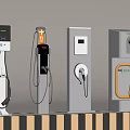 Various Electric Vehicle Charging Stations With Modern Designs And Charging Cables
