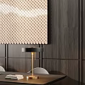 Modern Table Lamp With Black Shade Gold Base And Books On Wooden Table