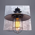 Industrial Black Metal Wall Light With Glass Shade And Vintage Filament Bulb On Gray Wall