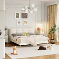 Cream Colored Double Bed With Upholstered Headboard Decorative Paintings Chandelier Green Plants And Plush Toys