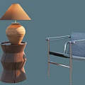 Modern Leisure Chair with Metal Frame and Gray Cushion Alongside Wooden Side Table and Lamp