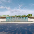 Modern Entrance Gate Design With Large Decorative Water Wall And Surrounding Greenery