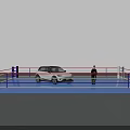 White SUV Parked on Blue Boxing Ring Platform with Person Standing