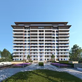 Modern Residential Building With Lush Green Lawns And Purple Flower Beds