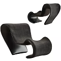 Contemporary Accent Chair With Stylish Curved Design And Upholstered Surface For Modern Living Spaces