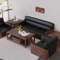 Black Leather Sofa and Wooden Coffee Table Set with Green Plant Magazine and Decor