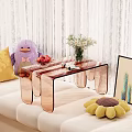 Transparent Copper Acrylic Coffee Table with Flower Vase Fruits Sofa Pillows and White Curtains