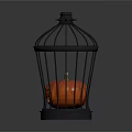 Black Metal Birdcage With Orange Apple for Decorative Home