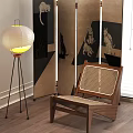 Modern Rattan Woven Accent Chair With Wooden Frame In Interior Design With Floor Lamp And Screen