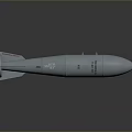 Gray Military Missile With Tail Fins And Surface Markings On Dark Background