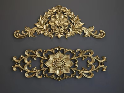 Golden Decorative Carvings With Intricate Floral Patterns And Curved Leaf Designs 3d model
