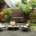 Modern Courtyard Garden Design With Wooden Walls Fireplace Chairs Round Coffee Table And Green Trees
