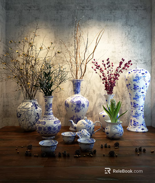 Blue and White Ceramic Vases with Red Flowers Green Plants and Branches on Wooden Table 3d model 