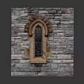Architectural Gray Stone Wall With Arched Window And Decorative Carvings And Glass Panes