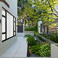 Modern Garden Landscape With Stone Path Green Plants Trees Bamboo And Seating Area Lighting