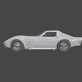 Sleek White Classic Sports Car With Streamlined Body And Chrome Wheels