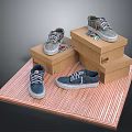 Grey Casual Sneakers Displayed On Stacked Cardboard Boxes For Home Use
