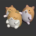 Three Cute Round Yellow White Cartoon Cat Plush Toys With Smiling Faces And Small Paws