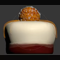 Delicious White Dessert With Red Drizzle And Orange Crunchy Topping