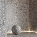 Terrazzo Wall With Color Swatches Display And Decorative Sphere In Various Tones