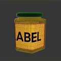 Clear Glass Storage Jar with Yellow Label and Black Lid for Household Daily Use