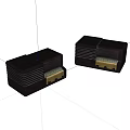 Two Black Electronic Devices With Square Design And Golden Connectors