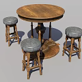 Three Wooden Leisure Chairs With Gray Padded Seats And Round Wooden Table